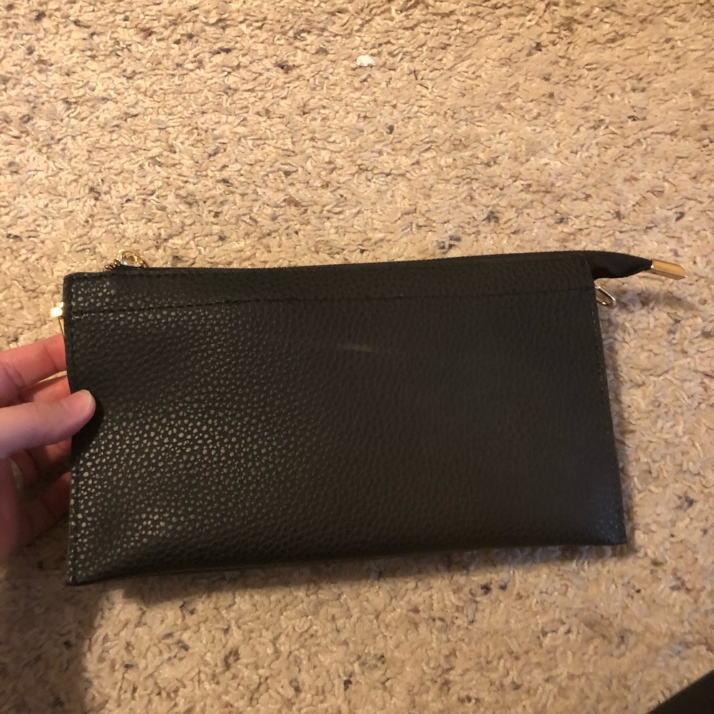 Black pebbles leather clutch